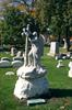 Surrogate mourner on cross