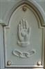 A white bronze Oddfellows emblem